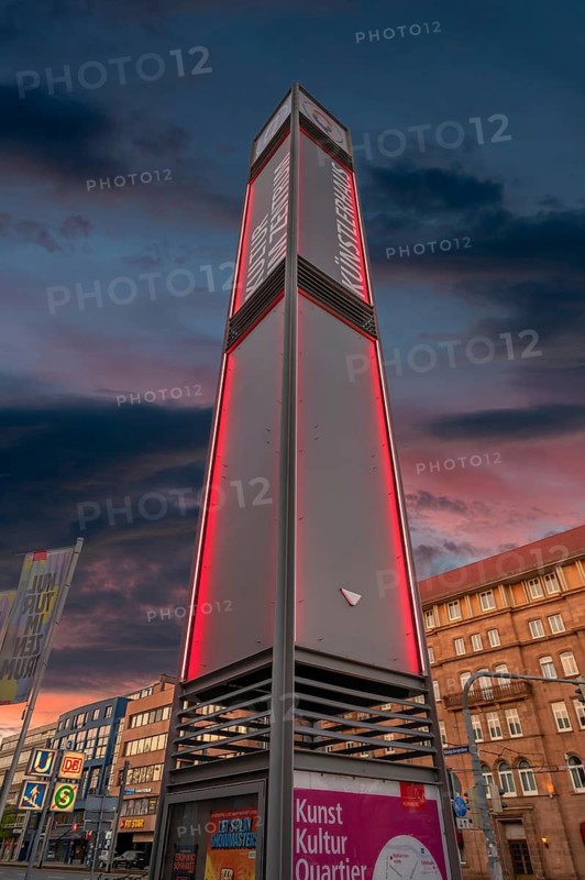 Advertising column from the Künstlerhaus at dusk, Königstr, Nuremberg, Middle Franconia, Bavaria, Germany