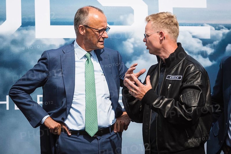 Friedrich Merz and Sven Kruck (Quantum Systems) at the presentation of the PULS P19 autonomous drone during the Chancellor's tour of the ILA (International Aerospace Exhibition) on 10 June 2026 at the Berlin-Schönefeld Exhibition Grounds