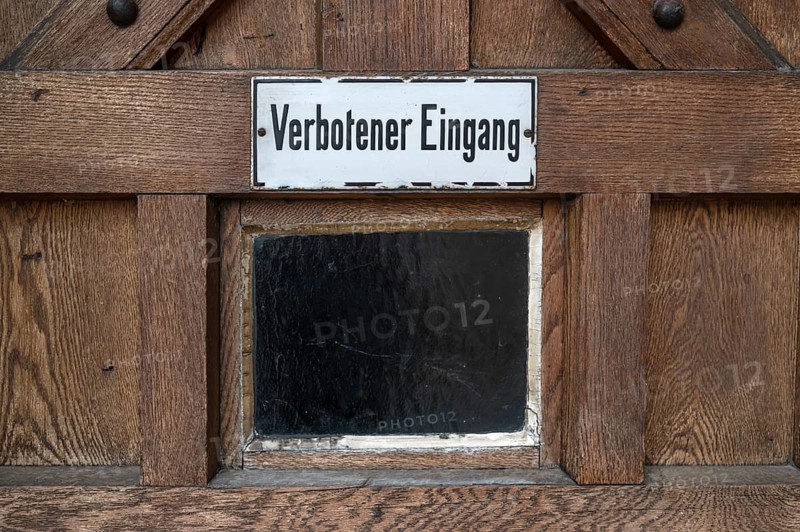 Prohibition sign on a door of an old company, Lauf an der Pegbitz, Middle Franconia, Bavaria, Germany