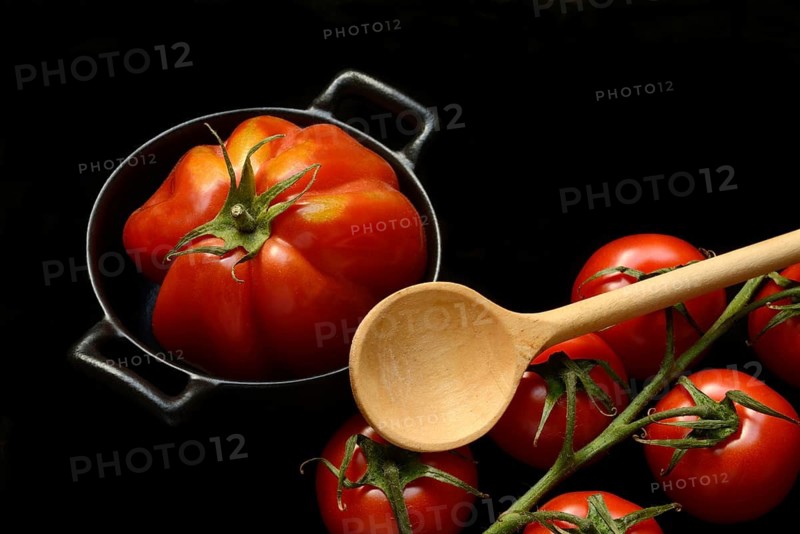 Oxheart tomato in pots and vine tomatoes, Solanum lycopersicum