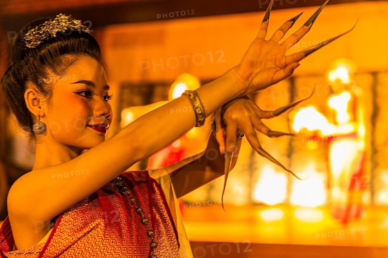 Young Thai woman showing a traditional dance, Old Chiang Mai Cultural Center, Chiang Mai, Thailand