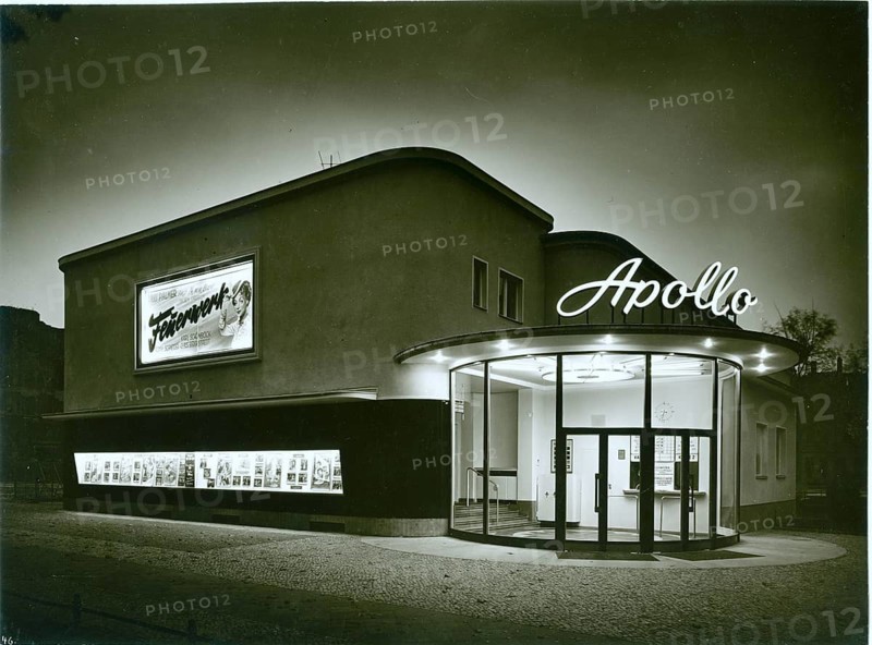 Berlin, Steglitz, Apollo Lichtspiele, Bismarckstr. 68-69, architecture, Hans Bielenberg, cinema, fifties, at night, A cinema building with the name Apollo, illuminated by neon light, with a movie poster on the wall, 1955