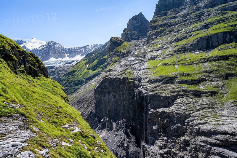 Rocky gorge with waterfall, mountain landscape with Grindelwald-Fiescherfirn glacier, Bernese Alps, Bernese Oberland, Switzerland