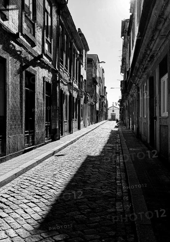 Rua do Pinheiro Street, a narrow and narrow typical street in the old town with the Capela de Nª Srª da Conceição da Quinta do Pinheiro at the end, Porto, Portugal