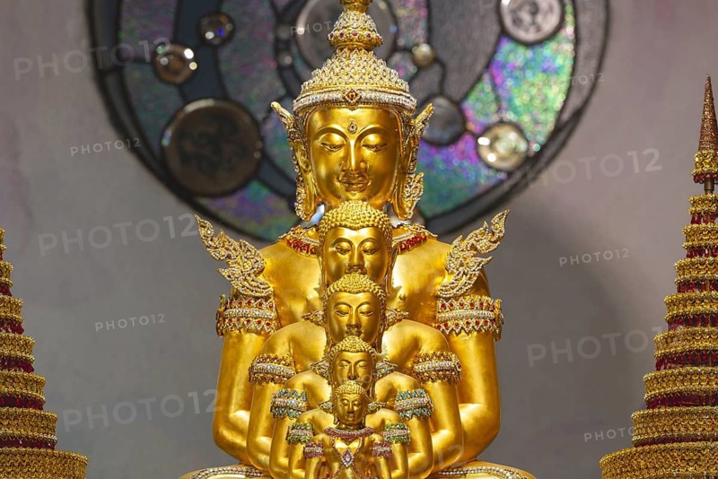 The Buddhas nestled within one another symbolise the inner journey, the continuity of the teachings and the infinite radiance of the Dharma, Main Chedi (Phra That), Wat Phra That Sorn Kaew Buddhist temple complex, Khao Kho Mountains, Phetchabun Province, Isan, Thailand