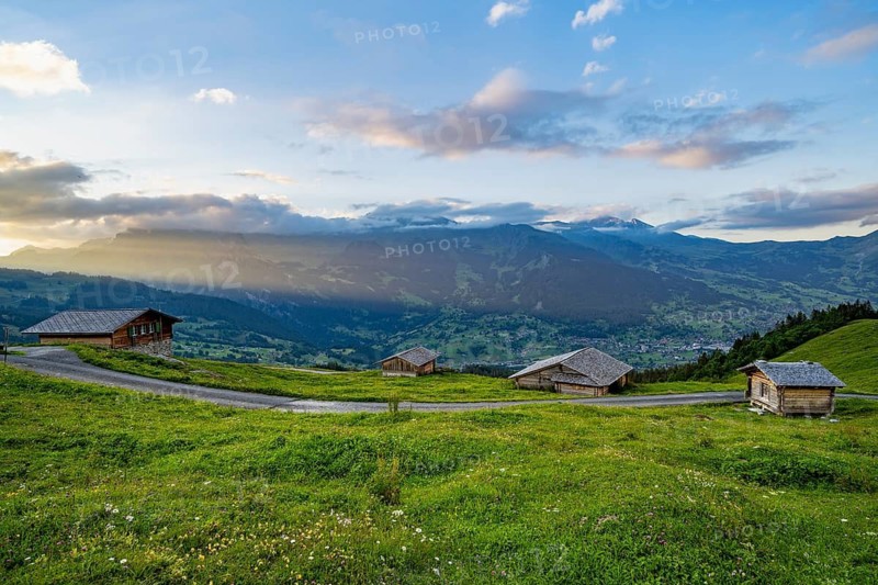 Alpine huts and alpine meadows, sunset, summit of the Wetterhorn in the background, Alpiglen, Grindelwald, Bernese Oberland, Switzerland
