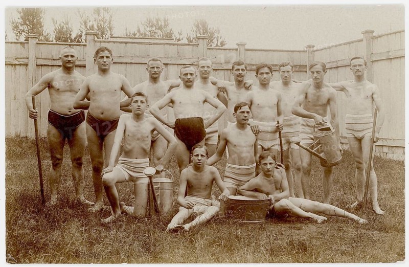 Bathing, swimwear, leisure, summer, men's pool, A group of men and boys posing with buckets and poles outdoors, 1926
