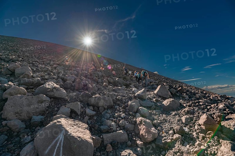 Low angle view of group of adventurers climbing the Cerro Negro volcano, León, Nicaragua – July 17, 2026
