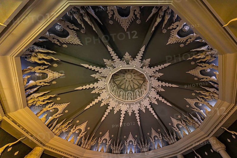 Decorated vaulted ceiling of the public prayer hall in the Buddhist temple complex Wat Phra That Don Phra Chan, near Lampang, Lampang Province, Thailand