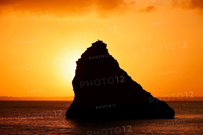 Rocks in the sea at sunrise, Praia Dona Ana, Lagos, Algarve, Portugal