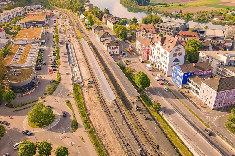 Urban area with rails near a river and green surroundings, electrification of the Hochrheinbahn, conversion of the railway station, Waldshut, Tiengen, Germany