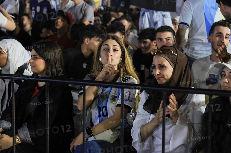 Damascus, Syria - July 19, 2026: Argentina supporters express despair as they react to their team's defeat immediately following the conclusion of the 2026 FIFA World Cup final match against Spain during a public viewing event in Damascus, Damascus, Damascus, Syria