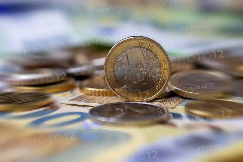 Close-up of euro banknotes and euro coins