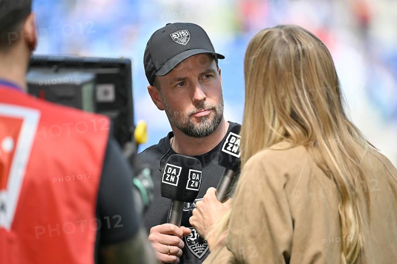 DAZN presenter reporter Sylvia Walker interview microphone micro logo trainer coach Sebastian Hoeness VfB Stuttgart soccer Bundesliga, PreZero Arena, Sinsheim, Baden-Württemberg, Germany
