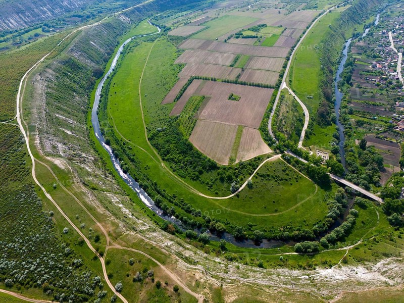 View of a green valley with a winding river and agricultural fields, aerial view, loop of Raut, Raut, view of Trebujeni, Old Orhei, Orheiul Vechi, archaeological site, protected landscape area, Orhei district, Republic of Moldova, Moldova, Moldova