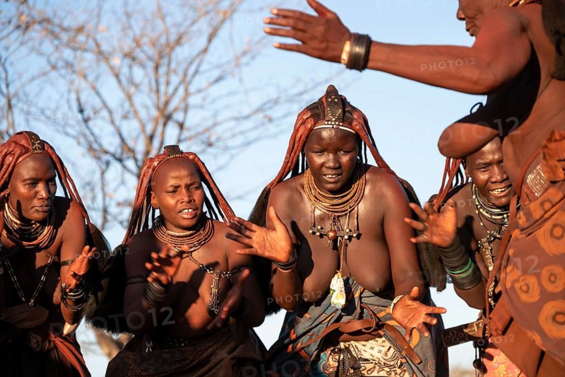 Himba woman dancing euphorically, traditional dance, traditional Himba village, Kaokoveld, Kunene, Namibia