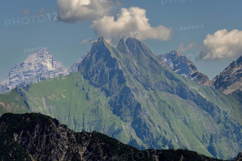 Summer in the Alps, mountain panorama from Fellhorn 2037 m, of the green grassy Höfats, 2259 m, Hochvogel in the back left, 2592 m, and on the right Kleiner Wilder, 2306 m, Allgäu Alps, Bavaria, Germany
