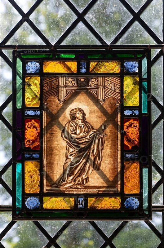 Stained glass depiction Saint John the Evangelist by C. J. W. Winter c 1840, church of Saint Andrew, Winston, Suffolk, England, UK