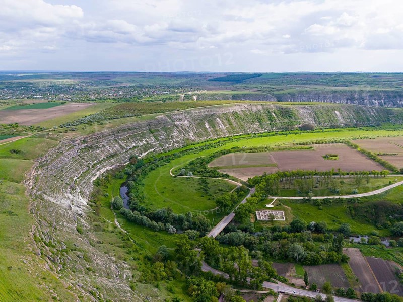 Landscape with rolling hills and fields crossed by a river, from a bird's eye view, aerial view, loop of the Raut river, Raut, Old Orhei, Orheiul Vechi, archaeological site, protected landscape area, Orhei district, Republic of Moldova, Moldova