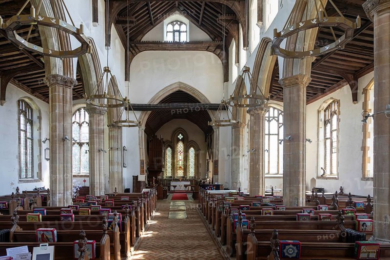View from nave to chancel inside village parish church of Saint Mary Magdalene, Debenham, Suffolk, England, UK