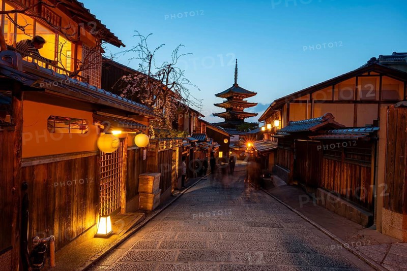Yasaka dori historic street in the old town with traditional Japanese houses, five-story Yasaka Pagoda of the Buddhist Hokanji Temple at the back, evening mood, blue hour, Higashiyama, Kyoto, Japan