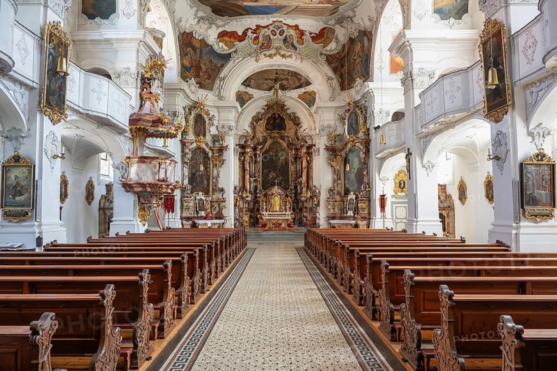 Magnificent baroque interior with ornate ceiling frescoes and stucco work by the Cathedral of Our Lady in Lindau am Lake Constance, Swabia, Bavaria, Germany