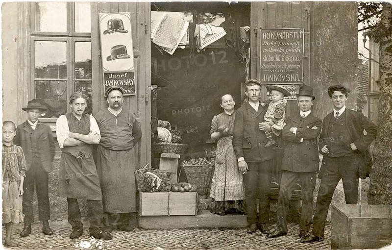 Kladno, Czech Republic, Lden für alles, fruit, vegetables, colonial goods, hats, men, seller, shop, sale, village life with people in traditional clothing in front of a vegetable stand, 1908