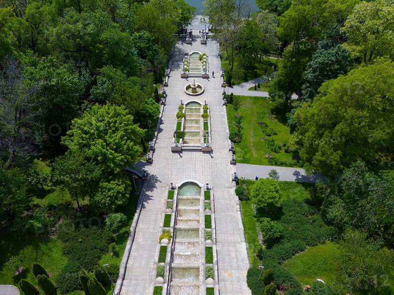 Long symmetrical garden path with fountain nestled in lush nature, cascade staircase, Scara Cascadelor, Valea Morilor Park, Valea Morilor Lake, Mühlental Lake, Chisinau, Chisinau, Chisinau, Moldova, Republic of Moldova, Eastern Europe