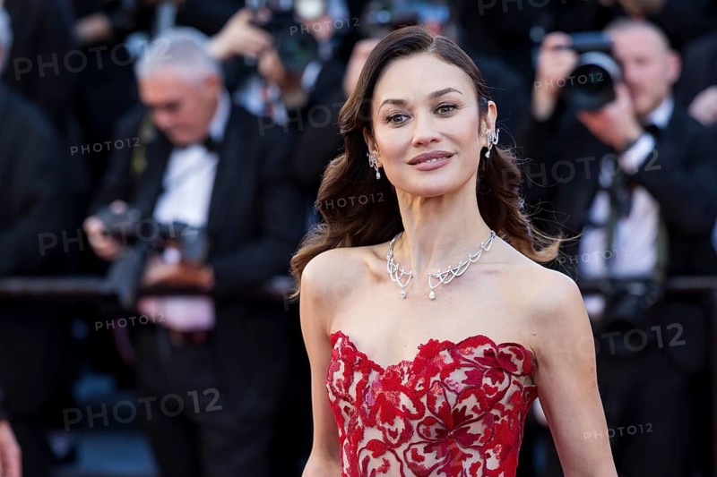 Olga Kurylenko with Karma on the Red Carpet at the Palais des Festivals et des Congrès during the 79th Cannes International Film Festival. The 79th Cannes International Film Festival will take place from May 12 to 23, 2026