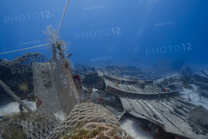 Underwater shot with destroyed shipwreck and entangled net, meteor wreck dive site, Russian hydrofoil, Arguineguin, Gran Canaria, Spain, Europe, Atlantic