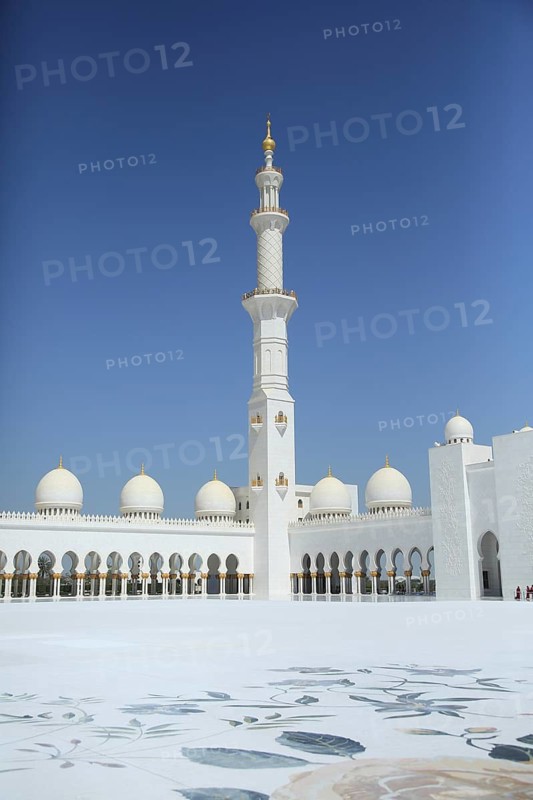 White minaret and mosque domes against blue sky with floor pattern, Sheik Zayed Mosque, Sheikh Zayed Mosque, Grand Mosque, Abu Dhabi, Middle East, Emirate, United Arab Emirates, UAE, island in the Persian Gulf, peninsula, exterior view, blue sky, white mosque