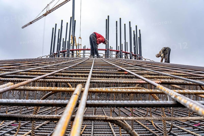 Assembly of reinforcing steel for the reinforced concrete foundation of a wind turbine, a mesh of rebar and rebar mesh, over 100 tons of reinforcing steel were used, the wind turbine will have a hub height of 160 meters, part of a new wind farm in Sauerland, near Balve, North Rhine-Westphalia, Germany