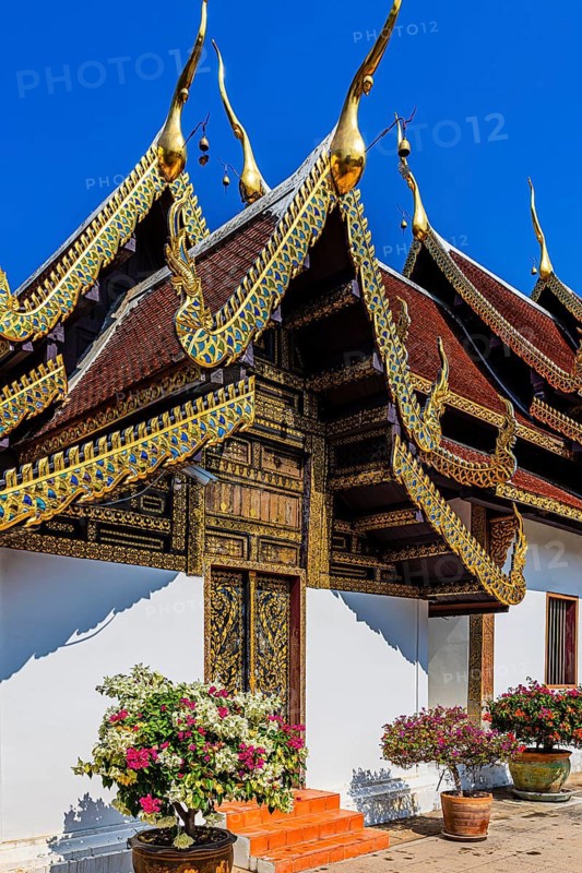 Artfully decorated gable roof with gilded ornaments, Buddhist temple complex Wat Phra That Si Chom Thong, near Chiang Mai, Chiang Mai Province, Thailand