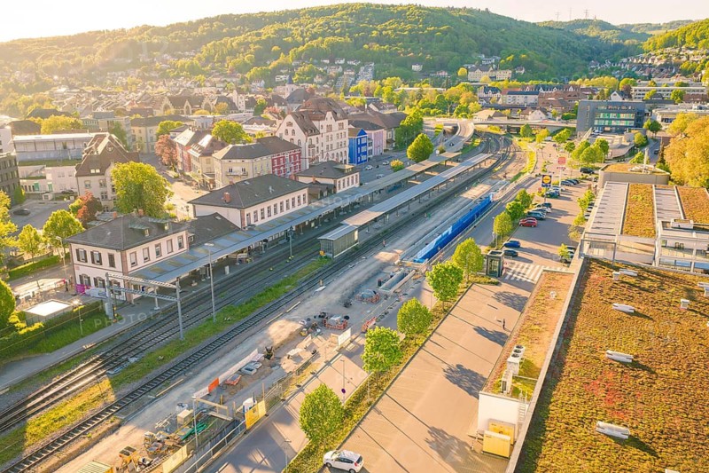 Aerial view of a train station with surrounding houses and green landscape, electrification of the Hochrheinbahn, conversion of the station, Waldshut, Tiengen, Germany