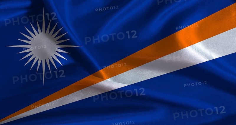 Marshall Islands flag with cloth textured background. National flag of Marshall Islands with realistic texture