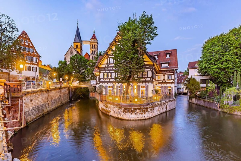 Neckar canals in the old town of Esslingen. Confluence of the Roßneckar Canal and the Wehrneckar Canal with the half-timbered house and the town church of St. Dionys. City view of Esslingen am Neckar. Esslingen a. N, Baden-Württemberg, Germany