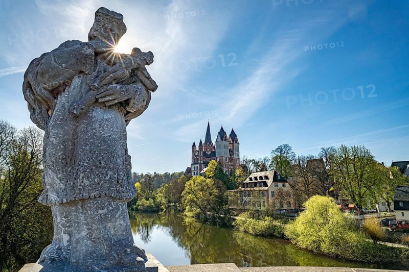 Nepomuk statue on the Old Lahn Bridge, the Lahn and the cathedral in Limburg an der Lahn, Hesse, Germany
