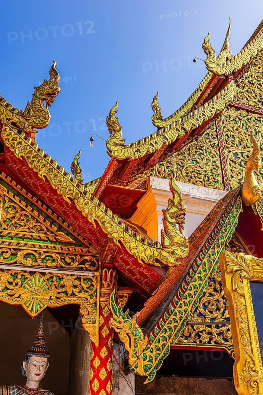 Curved roof beams, chofas, with gilded wood ornaments, Wat Phra That Doi Suthep temple complex, Chiang Mai, Thailand