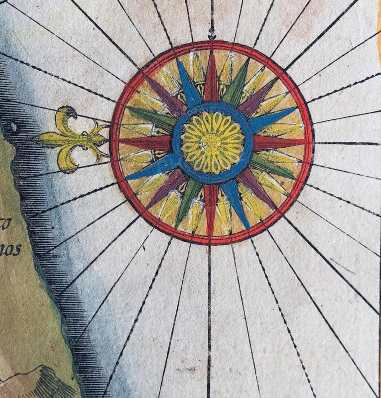 Old coloured map of Ceylon or Sri Lanka decorated with compass rose, by Jodocus Hondius from the Mercator Hondius Atlas, Amsterdam, 1633