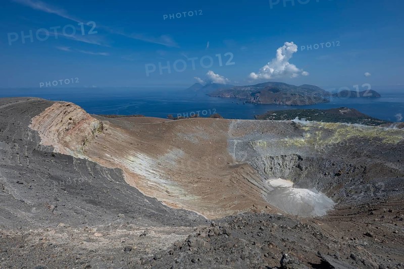 Crater, crater rim, sulfur vapors rise, in the background Panarea and Stromboli, Vulcano, Aeolian or Lipari Islands, Sicily, Southern Italy, Italy