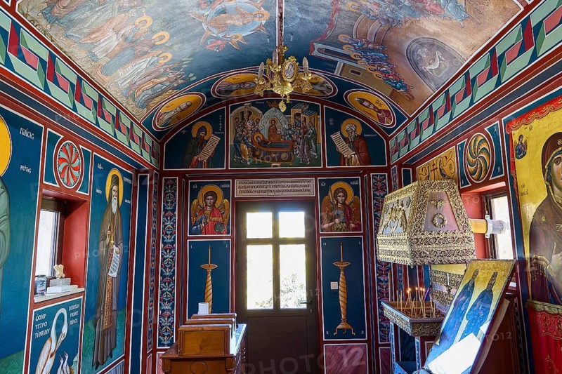 Richly decorated interior of a chapel with icons and wall paintings, monastery, Moni Odigitrias, southern Crete, located north of the Asterousia mountain range, built like a fortress, place of resistance against the Ottomans, central south, Crete, Greek islands, Greece
