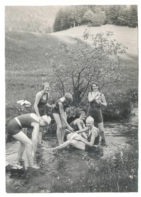 Bathing, swimwear, leisure, summer, woman, girls, boy girls splashing in a small stream and having fun, around 1928