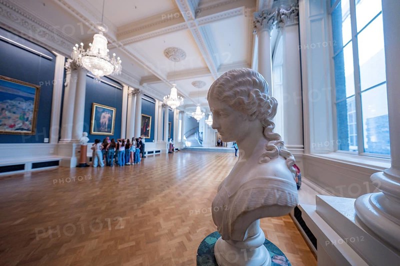 Art gallery with classic marble bust and magnificent chandeliers on the ceiling, National Gallery of Ireland, Dublin, Ireland