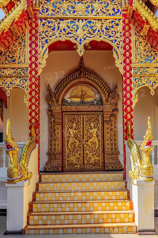 Gilded entrance doors with Buddhist motifs, Wat Phra That Doi Suthep temple complex, Chiang Mai, Thailand