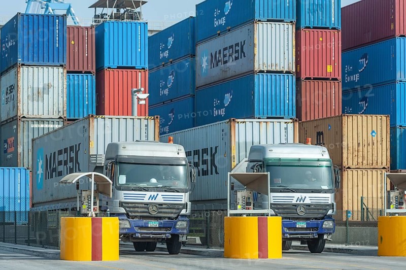 Abu Dhabi, United Arab Emirates. June 23rd 2019 Mearsk company shipping containers being loaded onto trucks for delivery at Khalifa Port, Abu Dhabi, United Arab Emirates, GCC, Middle East