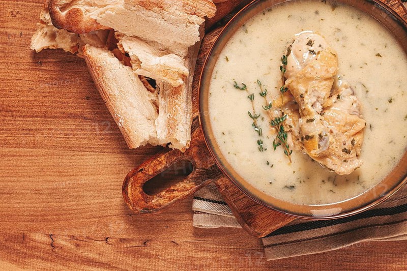 Chikhirtma chicken soup, Georgian dish, with lavash, top view, no people