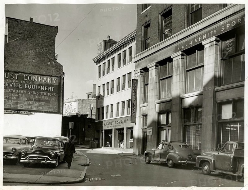 New York, SoHo, USA, classic cars, Vanity Sports, poor area, urban street scene with classic buildings and vehicles, captured in the nostalgic shadow of the past, around 1950