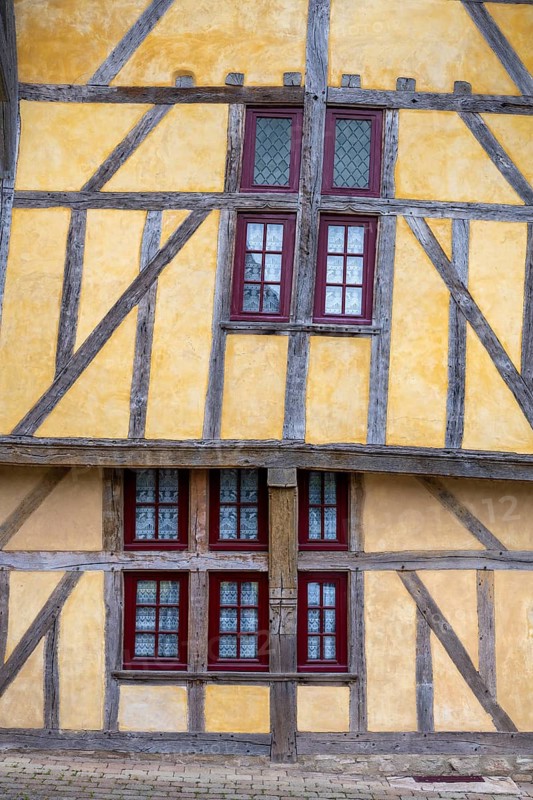 Detailed view of Maison du Dauphin, built in 1472, one of the oldest residential buildings in Troyes, fifteenth-century French half-timbered architecture with projecting gables and lattice windows in the historic city center, Troyes, Aube department, Grand Est region, France