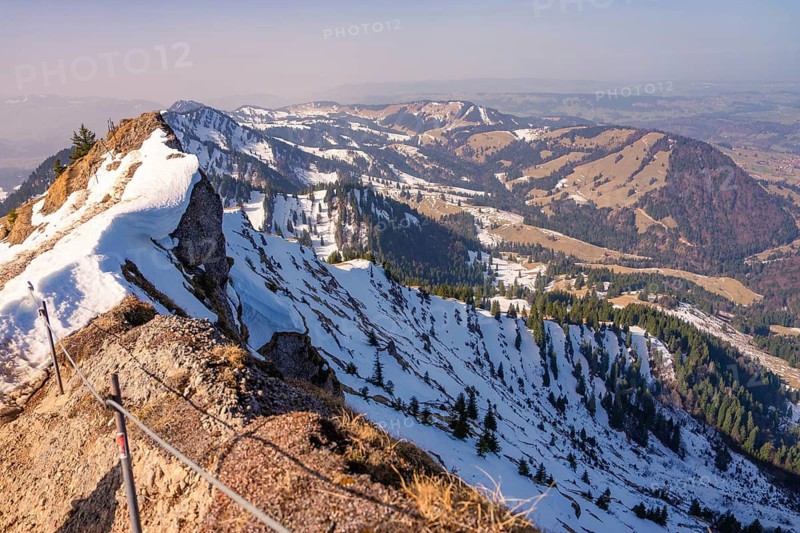 Snowy mountain peaks with a wide panorama of the surrounding alpine region under clear skies, Hochgrat, Allgäu, Bavaria, Germany