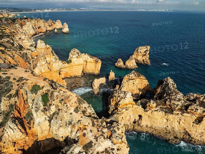 Aerial view of Ponte da Piedade in Lagos, Algarve, Portugal, with Atlantic ocean coves, cliffs and sea stacks